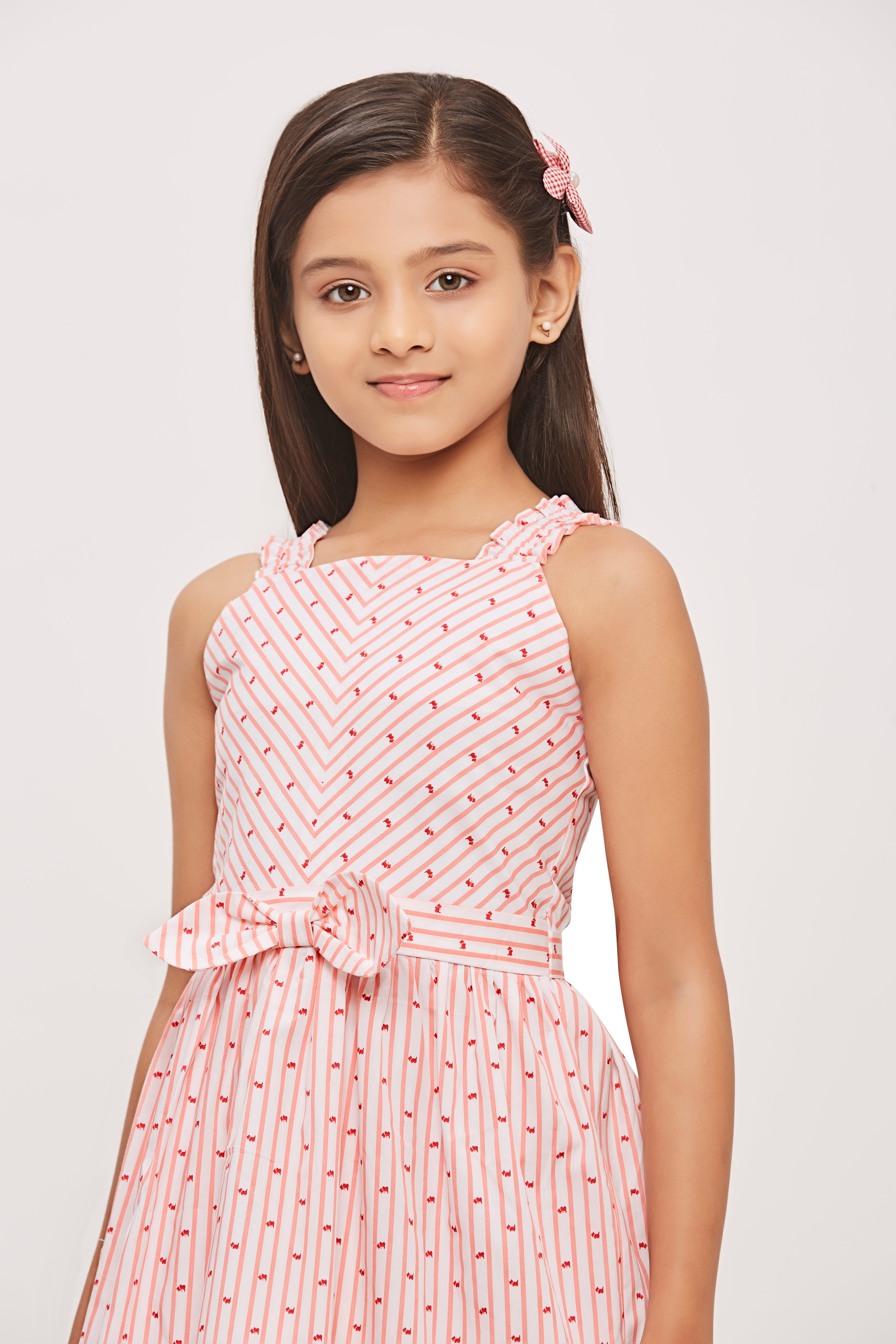 Tiny Girl Sleeveless Design And Playful Stripe Pattern Frock